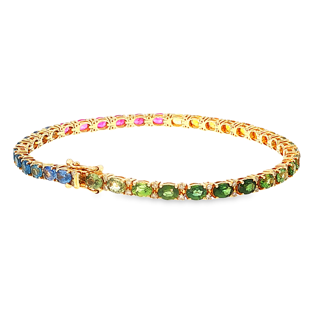 Tennisarmband aus 14kt Gelbgold mit Saphiren und Diamanten