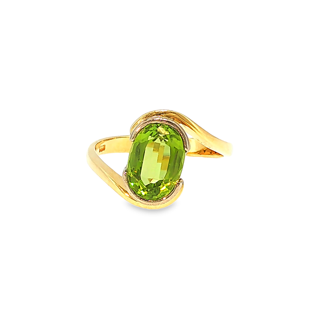 18kt Gelbgold Solitärring mit ca. 4ct Peridot im Bypass-Design