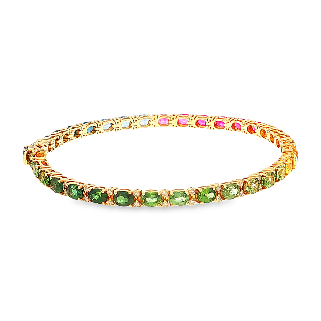 Tennisarmband aus 14kt Gelbgold mit Saphiren und Diamanten