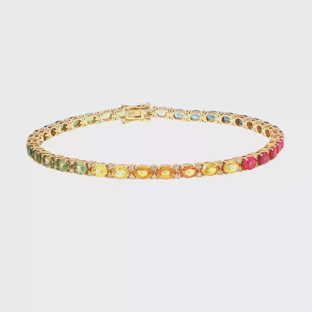 Tennisarmband aus 14kt Gelbgold mit Saphiren und Diamanten